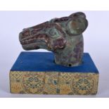AN UNUSUAL CHINESE QING DYNASTY SILVER AND GOLD INLAID BRONZE FINIAL formed as a deer like animal m