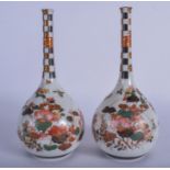 A PAIR OF EARLY 20TH CENTURY JAPANESE MEIJI PERIOD KUTANI VASES. 22 cm high.