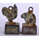 A PAIR OF CHINESE BRONZE SEAL PENDANT, one formed with cockerel terminal and the other a rabbit. 2.