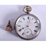 AN ANTIQUE SILVER POCKET WATCH W Pearce Brighton, together with a gold seal. (2)