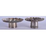 TWO 19TH CENTURY CHINESE TIBETAN SILVER PEDESTAL DISHES possibly tea bowl holders. 220 grams. 12 &