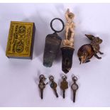 A CARVED BONE BOTTLE STOPPER, together with clock keys etc. (qty)