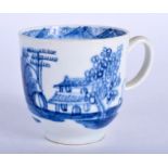 A 18TH CENTURY BOW COFFEE CUP painted in blue with a Chinese landscape. 7.5 cm high.