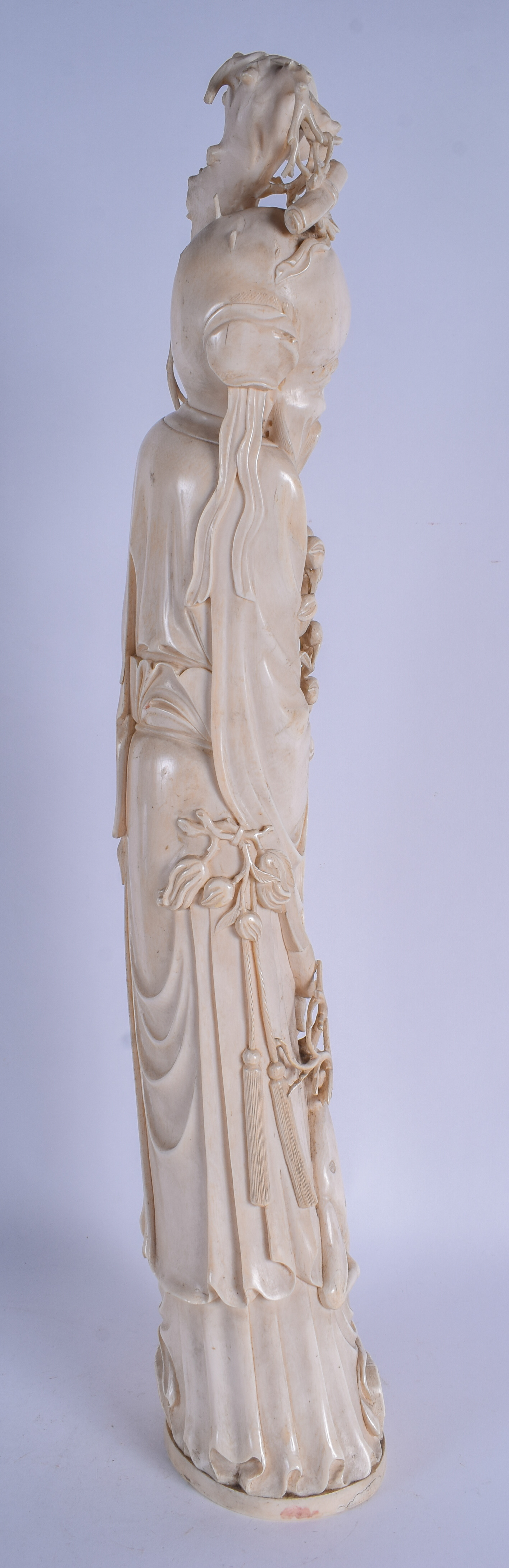 A VERY LARGE 19TH CENTURY CHINESE CARVED IVORY FIGURE OF SAGE Late Qing, modelled standing beside a - Image 6 of 7