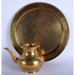 A 19TH CENTURY ISLAMIC MIDDLE EASTERN BRASS CHARGER together with an early bronze ewer. 30 cm & 18