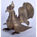 A 19TH CENTURY INDIAN ISLAMIC BRONZE INDIAN BIRD inset with jewels. 15 cm wide.