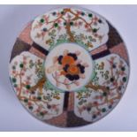 A 19TH CENTURY JAPANESE MEIJI PERIOD IMARI DISH painted with foliage. 30 cm diameter.