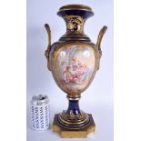 A LARGE 19TH CENTURY FRENCH TWIN HANDLED SEVRES PORCELAIN VASE painted with lovers within a landsca