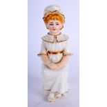 A ROYAL WORCESTER KATE GREENAWAY FIGURE OF A SEATED GIRL CENTURY 1880’S. 10.5 cm high.