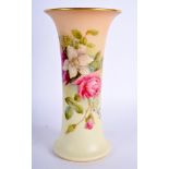 A ROYAL WORCESTER TRUMPET SHAPED BLUSH IVORY VASE painted with flowers having a green mark with Bri