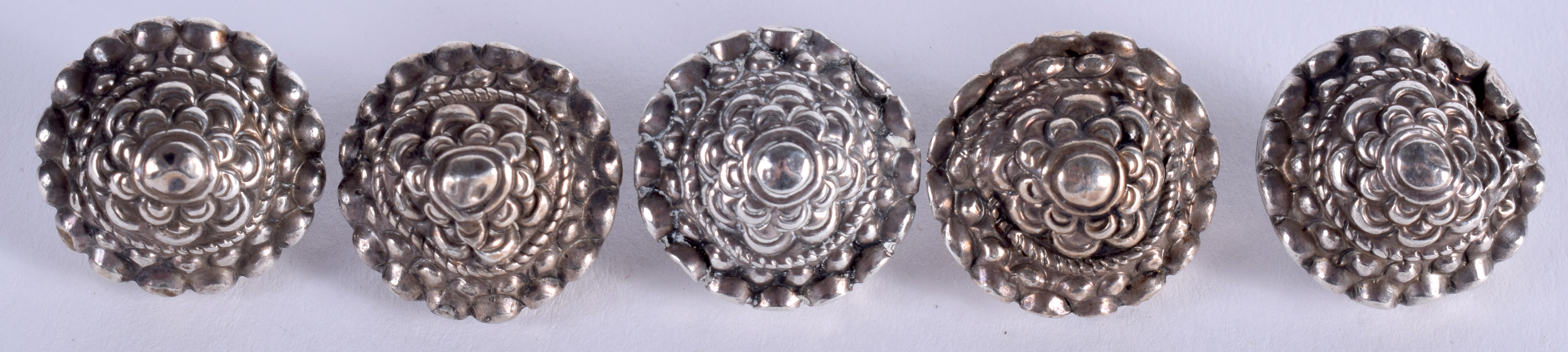 FIVE 19TH CENTURY SILVER BUTTONS. (5)