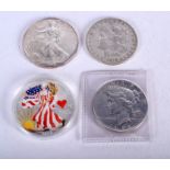 THREE SILVER EAGLES and a 1922 silver dollar. (4)