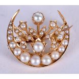 A VICTORIAN 9CT GOLD AND PEARL BROOCH. 4.3 grams. 3 cm wide.