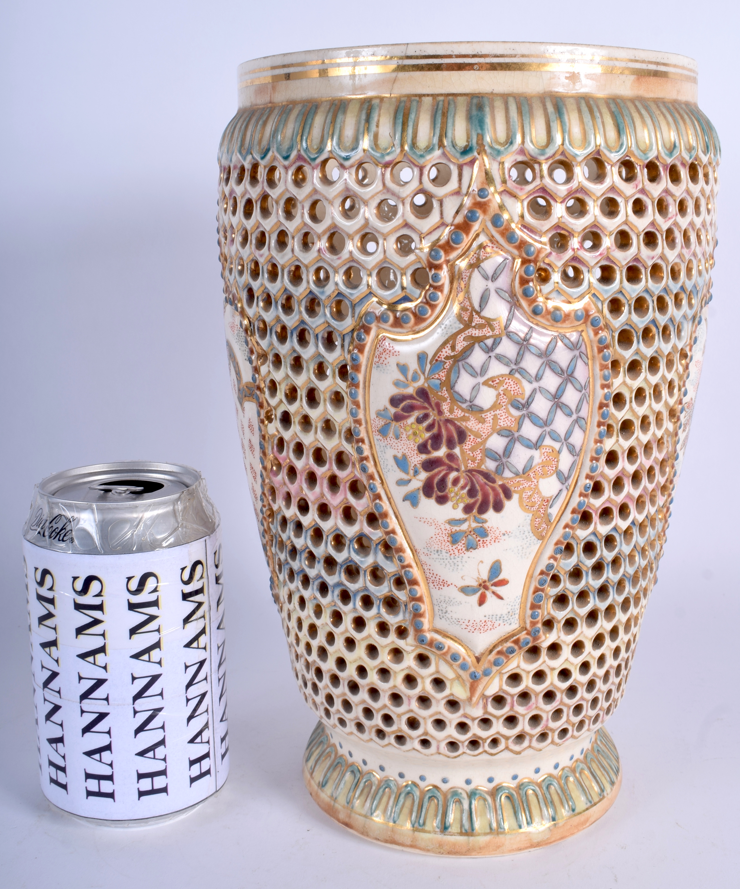 A 19TH CENTURY HUNGARIAN RETICULATED FISCHER BUDAPEST VASE painted with flowers. 26 cm high.