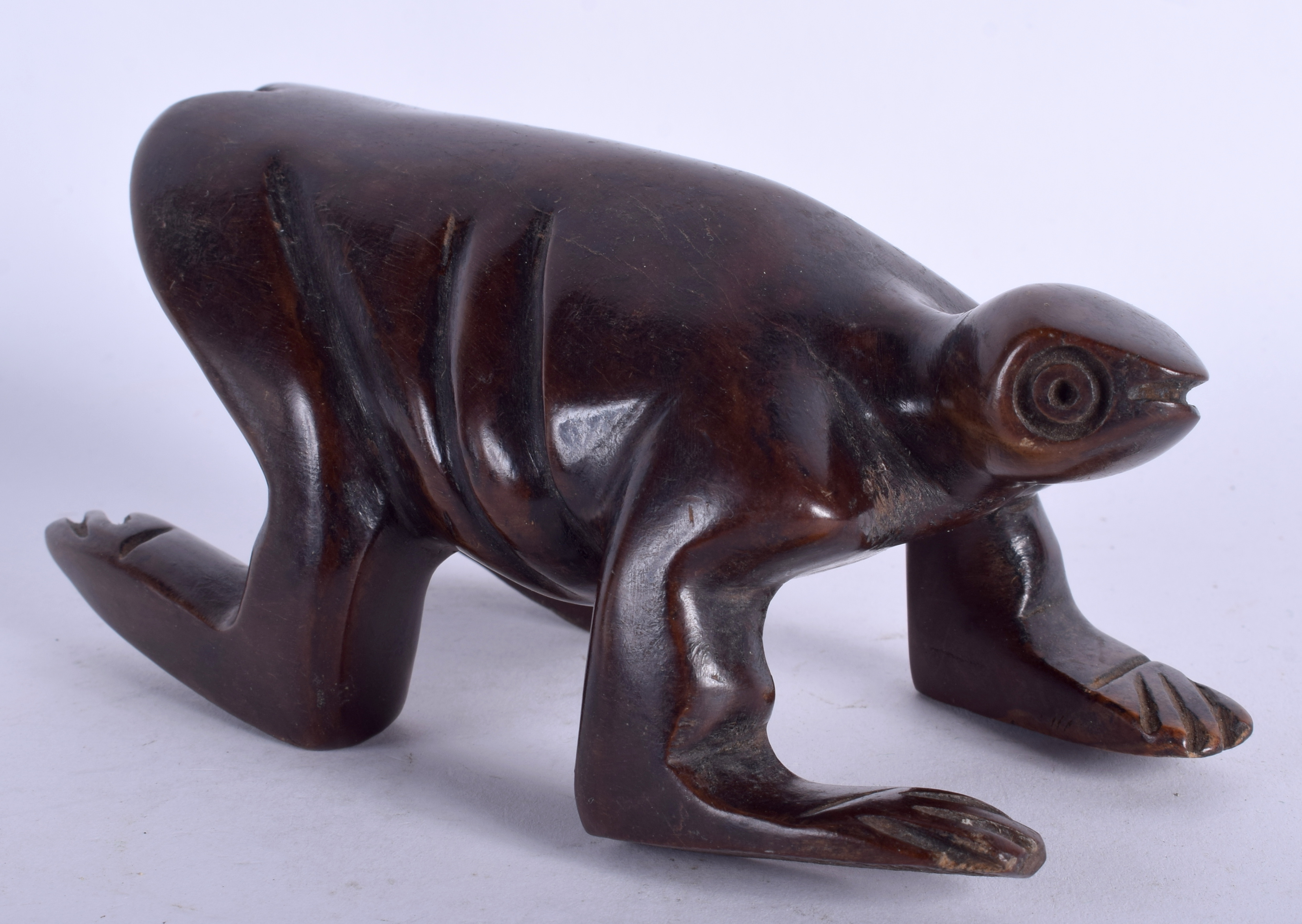 AN EARLY 20TH CENTURY CONTINENTAL CARVED WOOD FIGURE OF AN INSECT of Zoomorphic inspiration. 16 cm x