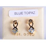 A PAIR OF 9CT GOLD TOPAZ EARRINGS.