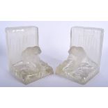 A PAIR OF 1950S FROSTED GLASS POLAR BEAR ICEBERG BOOKENDS. 17 cm x 10 cm.