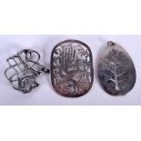 TWO SILVER BROOCHES a vintage silver pendant. (3)