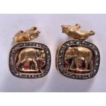 A PAIR OF SILVER GILT CONTINENTAL ENAMELLED ELEPHANT CUFFLINKS.