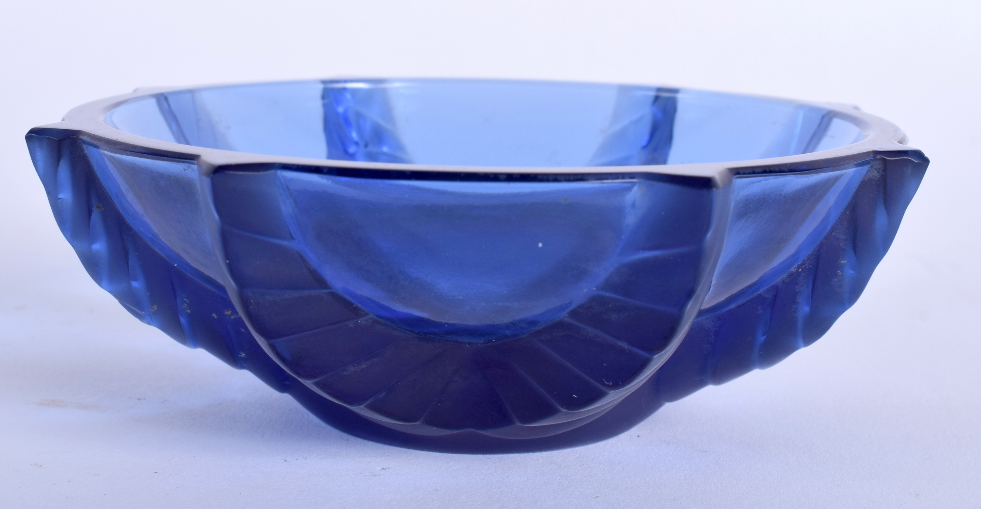 A LALIQUE BLUE GLASS BOWL, signed to base. 11 cm wide.