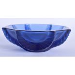 A LALIQUE BLUE GLASS BOWL, signed to base. 11 cm wide.