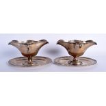 A LARGE PAIR OF ANTIQUE SILVER SAUCEBOATS. 1600 grams. 25 cm x 14 cm.