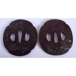 A PAIR OF 18TH/19TH CENTURY JAPANESE EDO PERIOD IRON TSUBA decorated in silver and gold with lotus.