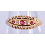 AN EDWARDIAN 18CT GOLD AND RUBY RING. 2.5 grams. M/N.