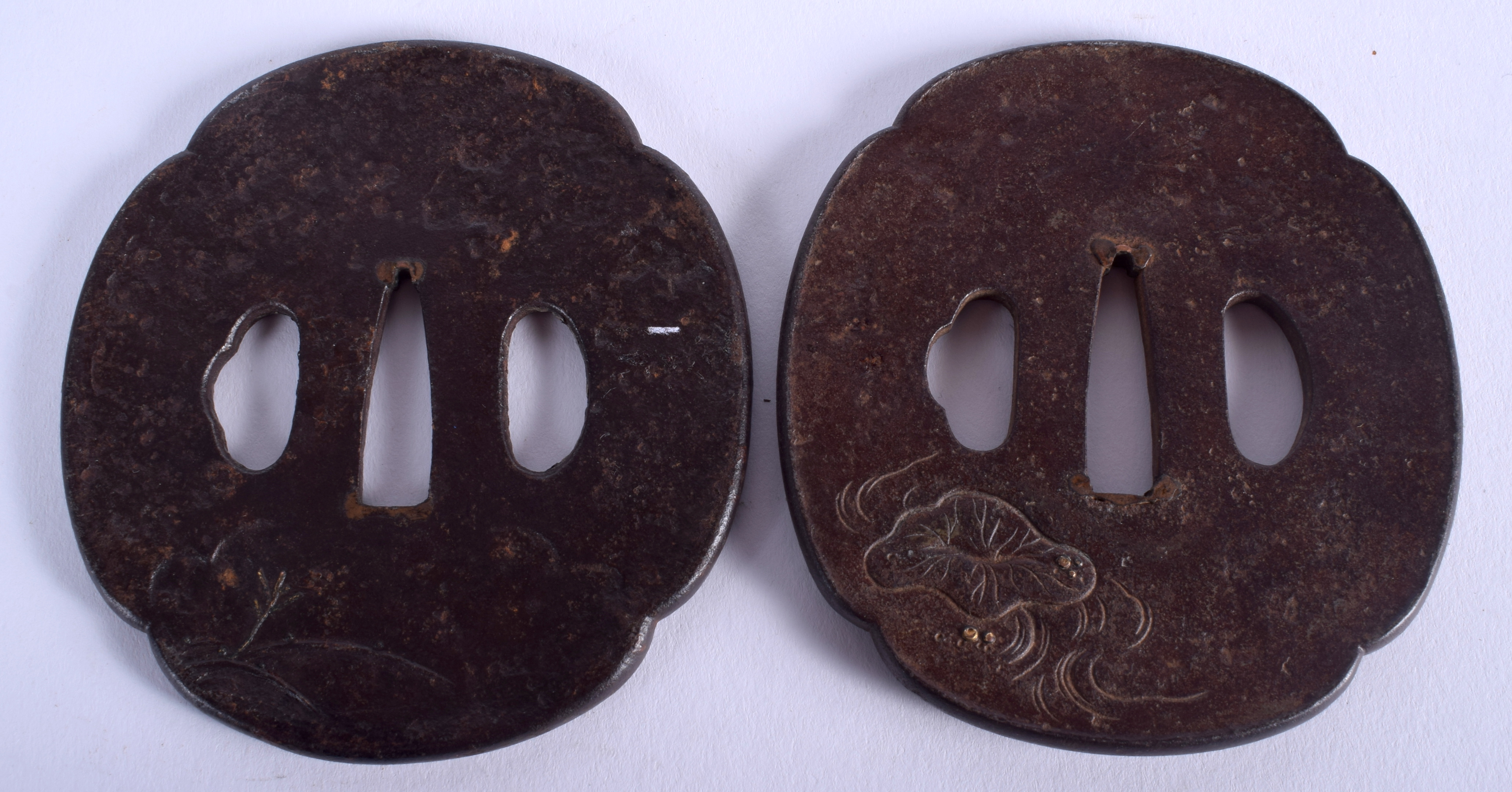 A PAIR OF 18TH/19TH CENTURY JAPANESE EDO PERIOD IRON TSUBA decorated in silver and gold with lotus. - Image 2 of 2