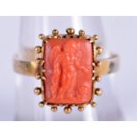 AN ANTIQUE GOLD AND CORAL RING. 3.3 grams. O/P.