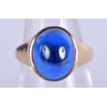 A VINTAGE 9CT GOLD BLUE STONE RING. 4.2 grams. K.