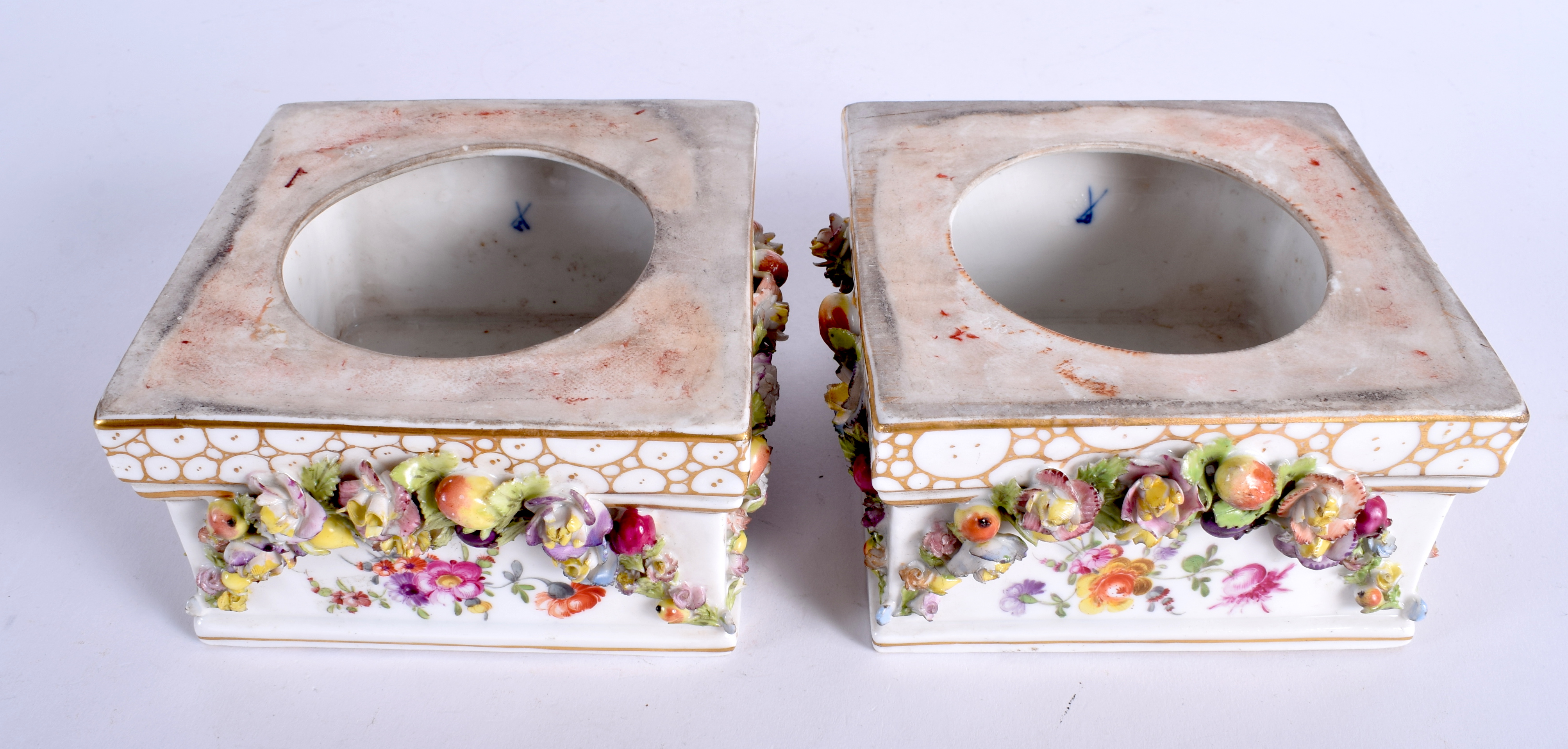 A PAIR OF 19TH CENTURY GERMAN PORCELAIN SQUARE FORM VASE STANDS painted with flowers. 12.5 cm square - Image 4 of 4