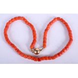 AN 18CT GOLD RED CORAL NECKLACE. 30 grams. 42 cm long.