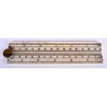 A BONE FOLDING RULER. 30 cm long.