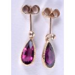 A PAIR OF 9CT GOLD AND AMETHYST EARRINGS.