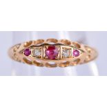 A 18CT GOLD RUBY AND DIAMOND RING. 2.3 grams .N.