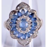 A VINTAGE 9CT GOLD SAPPHIRE AND DIAMOND RING. O. 5.6 grams.