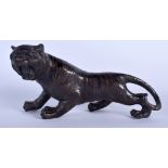 A JAPANESE BRONZE OKIMONO IN THE FORM OF A TIGER, modelled prowling with jaws exposed. 32 cm wide.