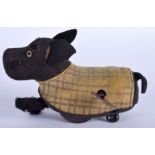 A VINTAGE WIND UP SCHUCO TARTAN DOG. 12 cm wide.