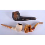 A TURKISH MEERSCHAUM PIPE, the bowl carved in the form of a male in a hat, together with another pip