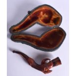 A VINTAGE CASED PIPE.