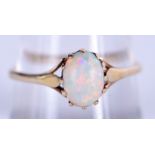 A VINTAGE GOLD AND OPAL RING. 1.8 grams. Q/R.
