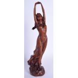 A CONTINENTAL CARVED WOOD MAIDEN. 24 cm high.