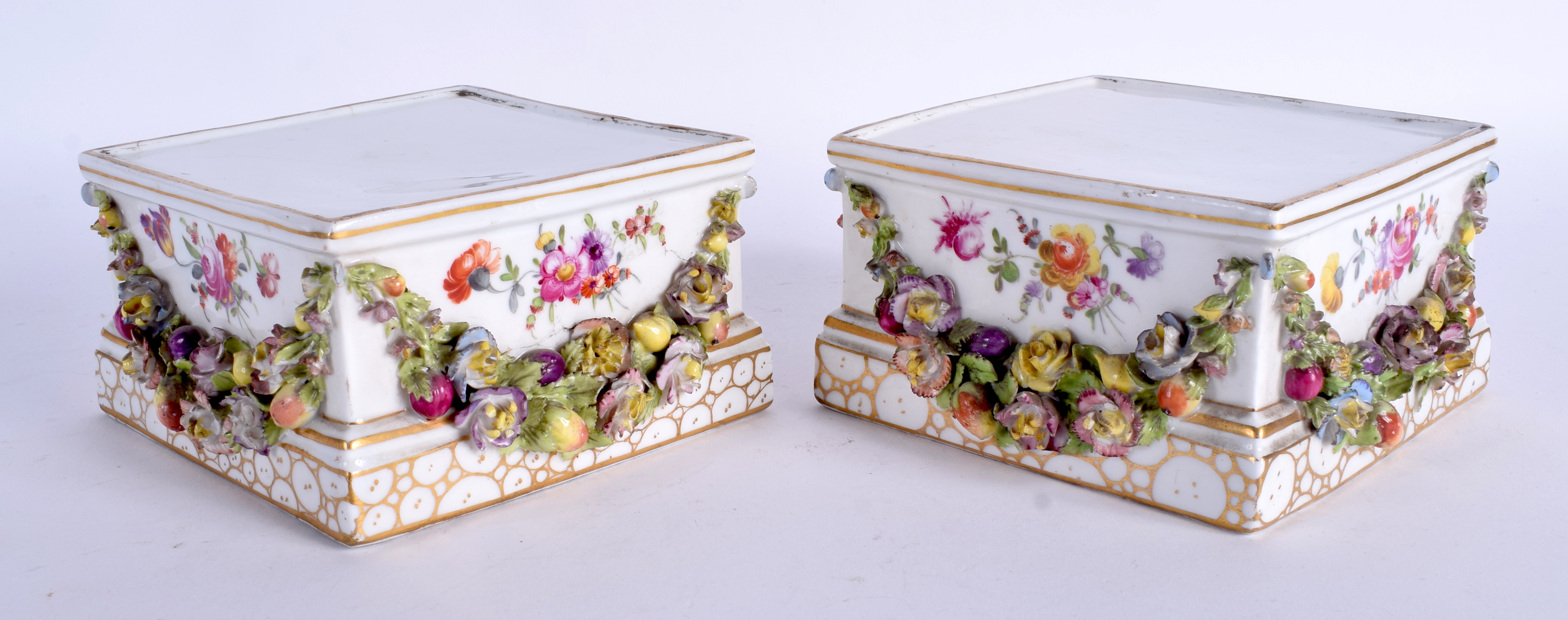 A PAIR OF 19TH CENTURY GERMAN PORCELAIN SQUARE FORM VASE STANDS painted with flowers. 12.5 cm square - Image 2 of 4