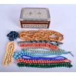 A VINTAGE BOX together with various necklaces. (qty)