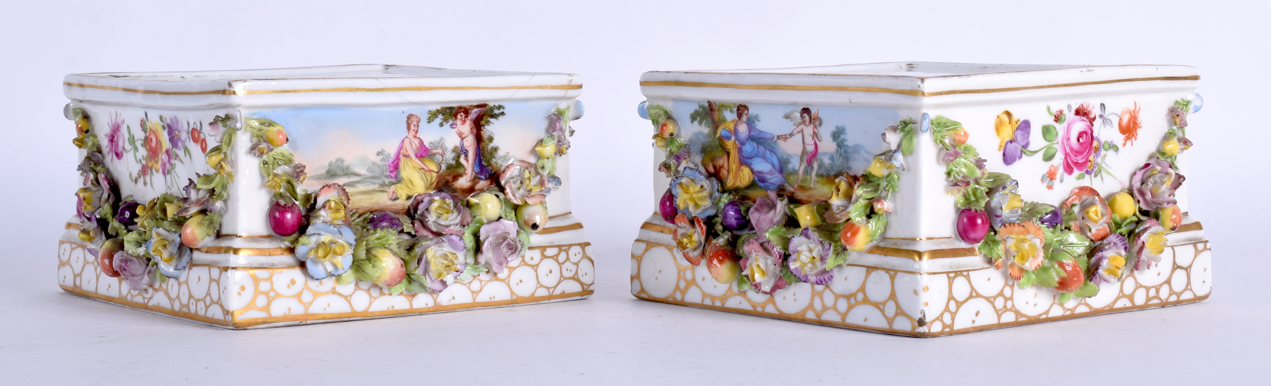 A PAIR OF 19TH CENTURY GERMAN PORCELAIN SQUARE FORM VASE STANDS painted with flowers. 12.5 cm square