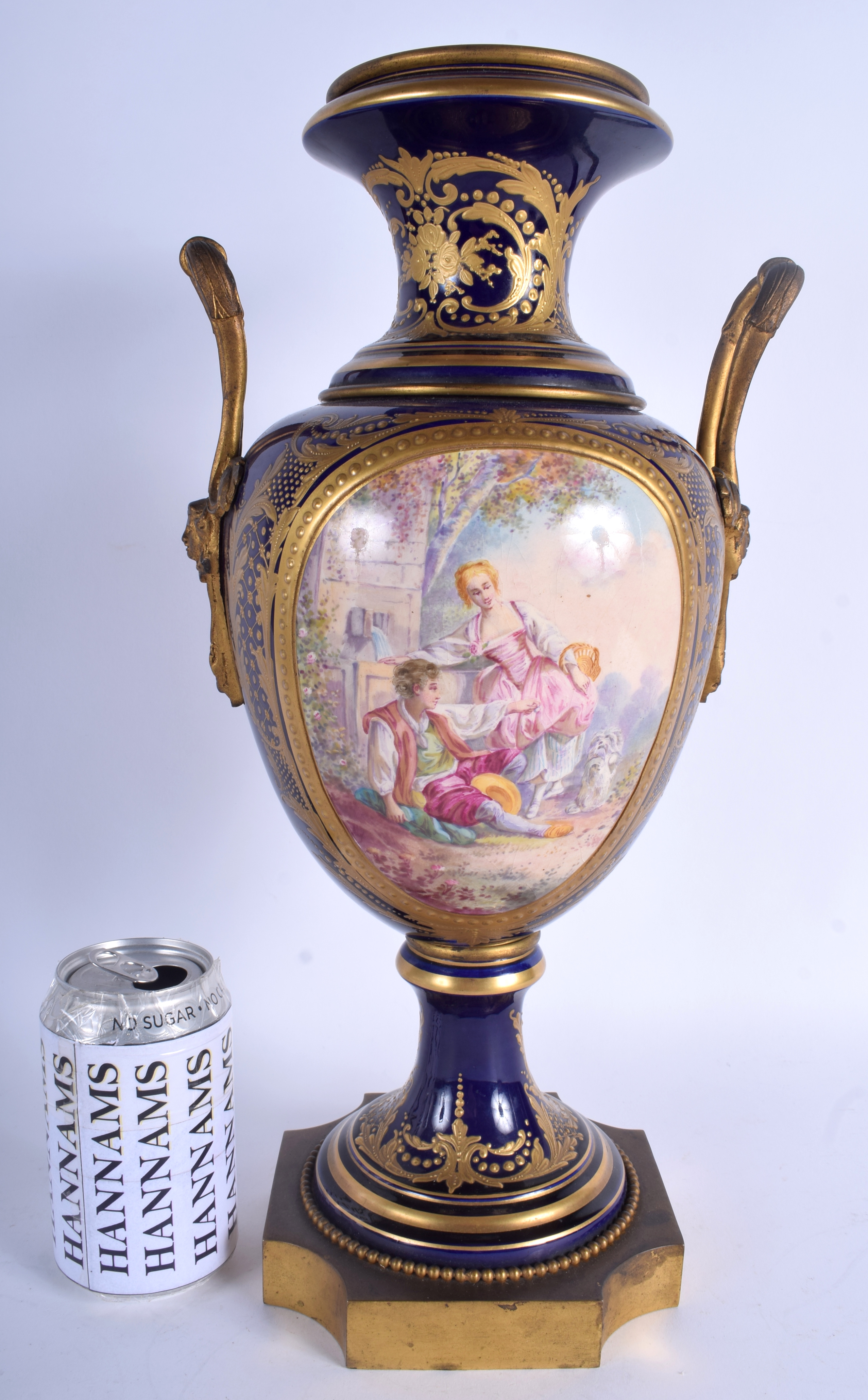 A LARGE 19TH CENTURY FRENCH TWIN HANDLED SEVRES PORCELAIN VASE painted with lovers within a landscap