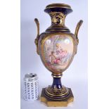 A LARGE 19TH CENTURY FRENCH TWIN HANDLED SEVRES PORCELAIN VASE painted with lovers within a landscap