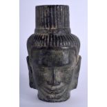 A CAMBODIAN BRONZE BUDDHA HEAD. 12 cm x 6.5 cm.