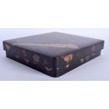 A 19TH CENTURY JAPANESE MEIJI PERIOD BLACK LACQUER WRITING BOX AND COVER decorated with fans and flo